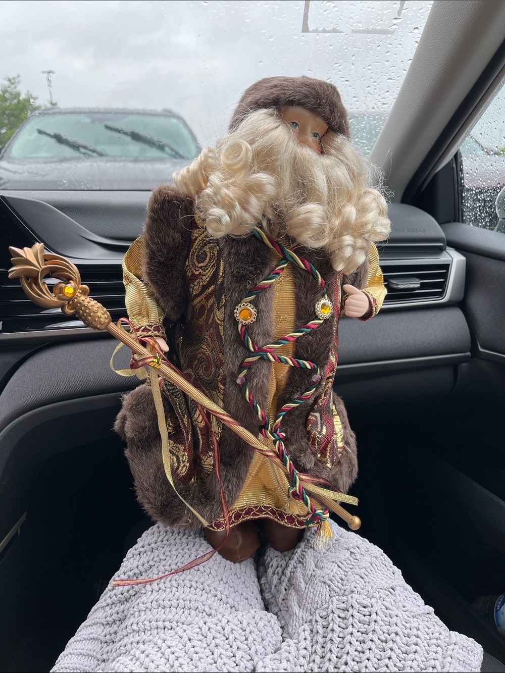 Decorative Santa Figure in Brown and Gold Outfit